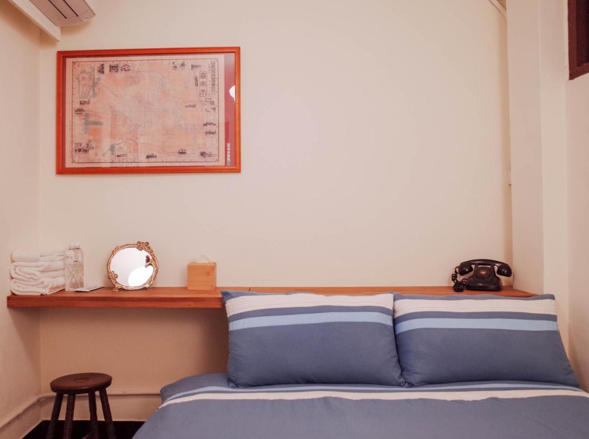 Neat Hostel Тайнан Стая снимка